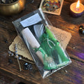 Abundance spell kit on a wooden surface with wutchcraft items