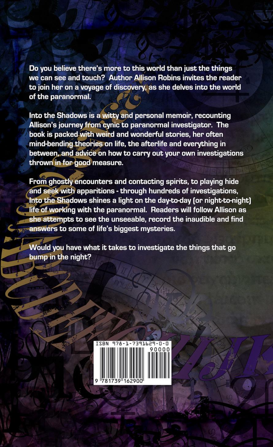 Book back cover with text and a barcode on a dark background