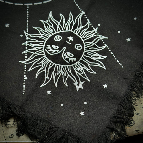 Black fringed altar cloth with white celestial designs