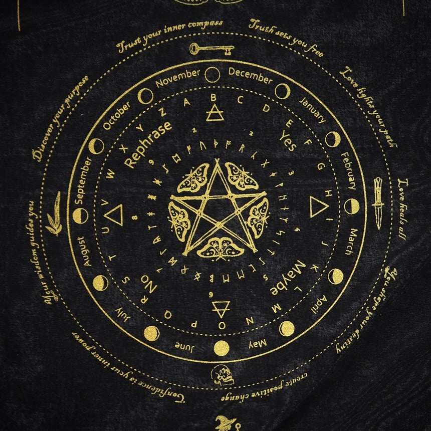 Mystic moth design in gold on a black cloth. Featuring central pentagram with moths around it surrounded by phrases, months and symbols