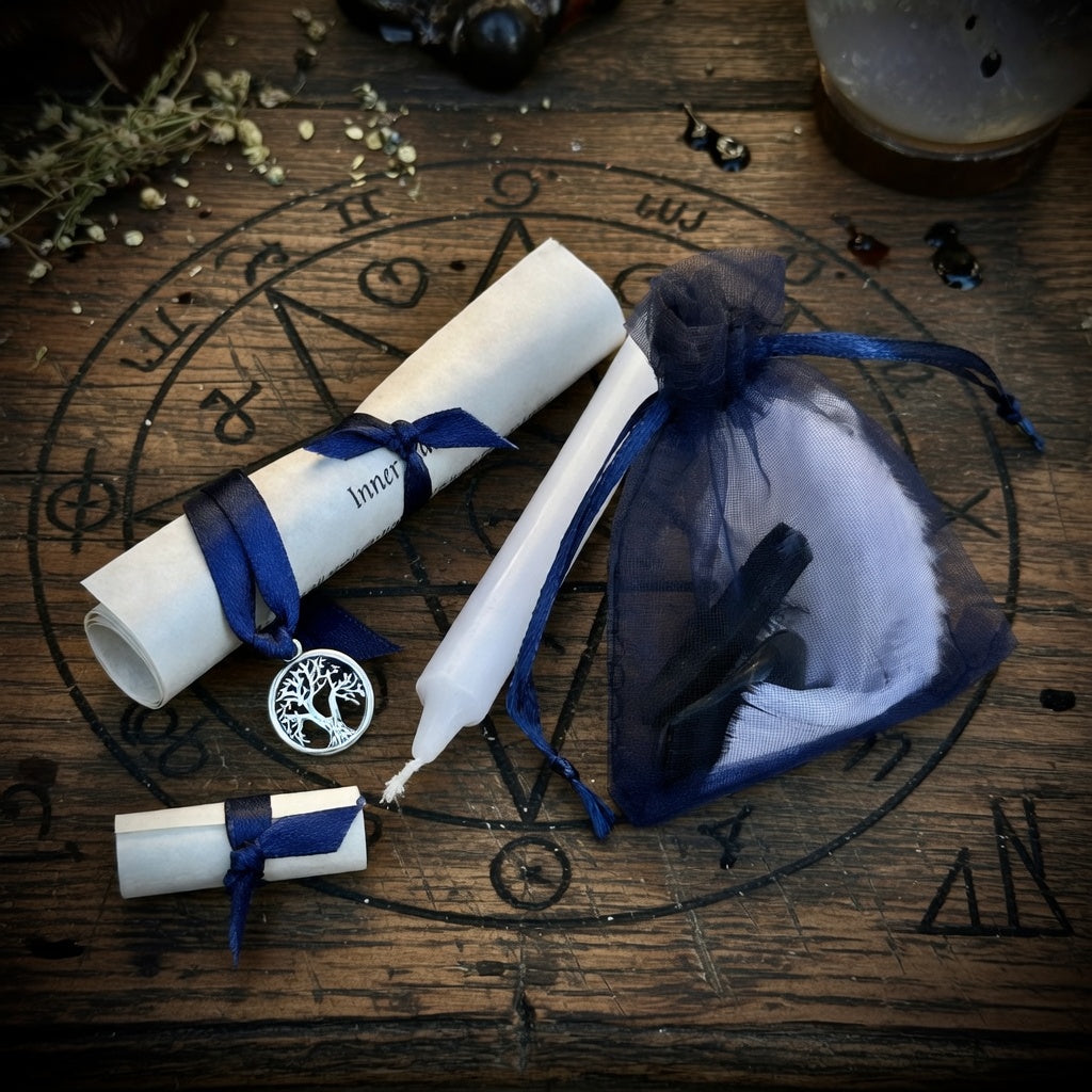 Inner calm spell kit with scroll, candle,tree of life toekn and pouch, on a witchcraft themed carved wood surface