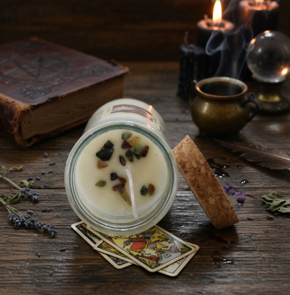 Spell candle for friendship, with decorative elements on a wooden surface