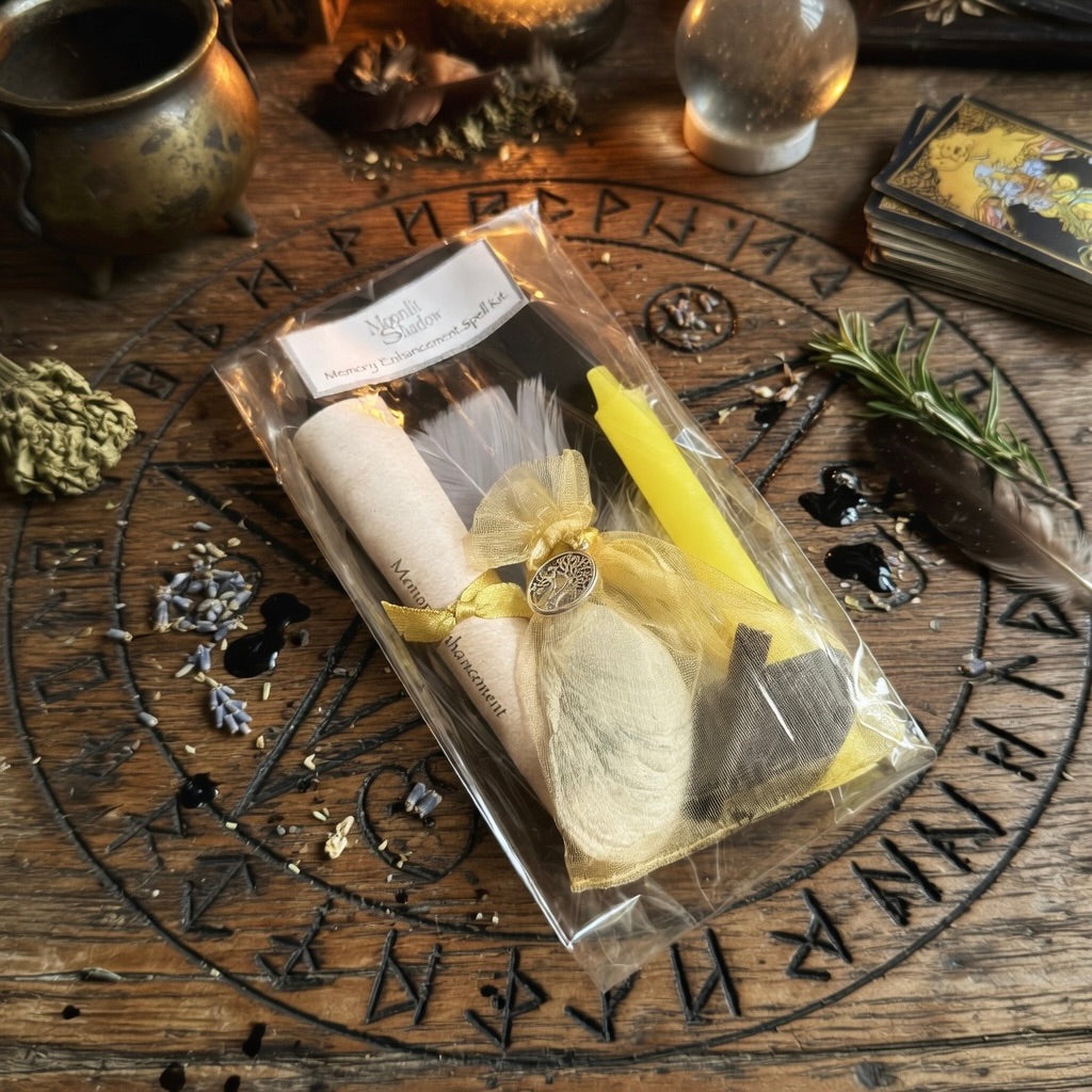 Moonlit Shadow memory enhancement spell kit on a carved wooden surface with a sprinkling of herbs and tarot cards