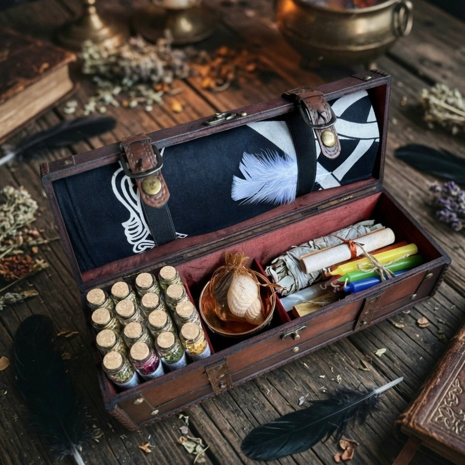Open wooden witchcraft chest, filled with bottles, a feather, and other items on a wooden surface.