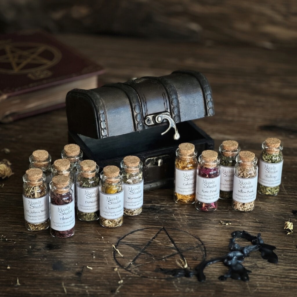 Collection of small glass herb bottles with cork lids on a wooden surface, with a treasure chest and occult symbols in the background.