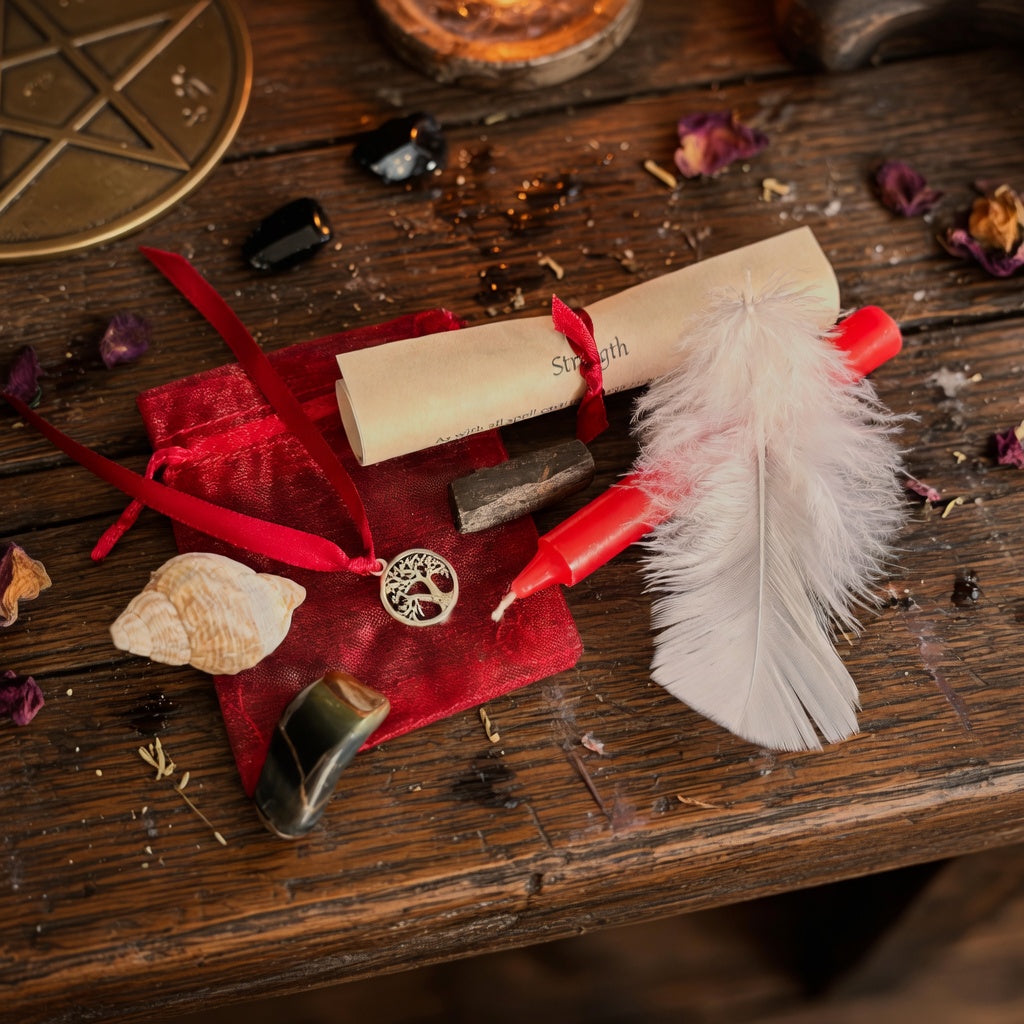 Strength spell kit with scroll, feather, candle and shell, on rough dark wood surface with sorcery item
