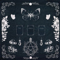 Black tarot reading cloth featuring past, present, and future, with witch's garden design. Skulls, butterflies, flowers and toadstools