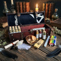 Open wooden chest with various witchcraft items on a wooden table, including bottles, a bowl, and scrolls.